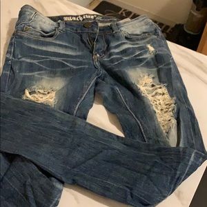 Machine ripped jeans